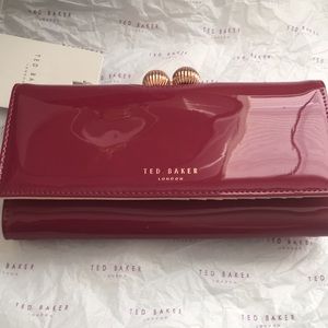 NWT Ted Baker wallet. Rose gold clasp and Zipper.